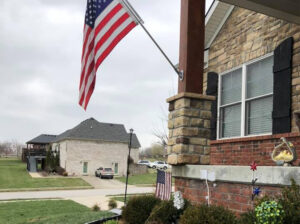 American Flag Hoisted Outside of Home